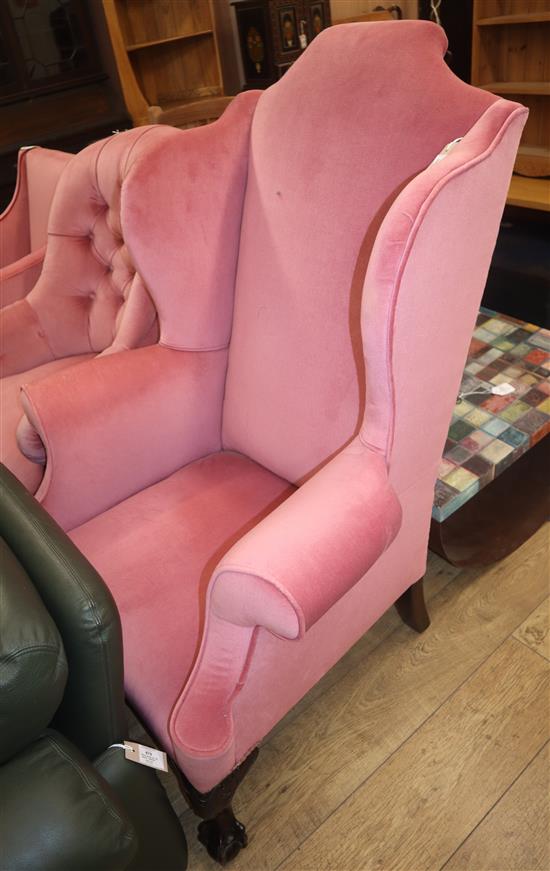 A plum dralon wing armchair